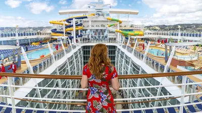 Woman standing in front of pool deck on Symphony of the Seas