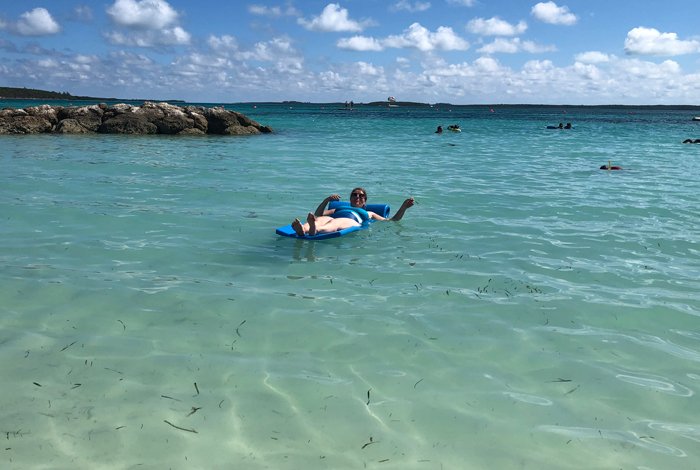 tourist on floating mat