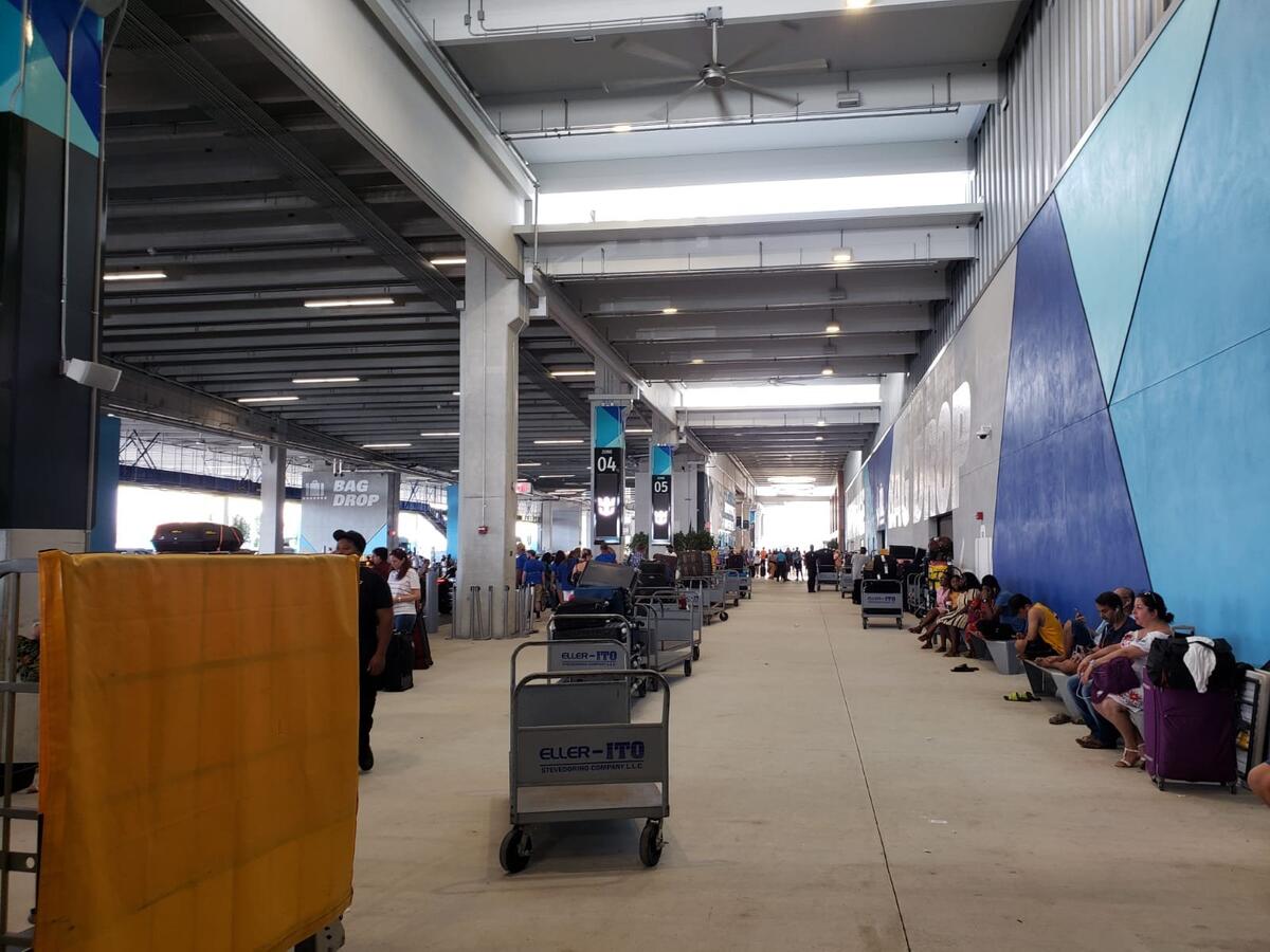 Should you use the porters to take your luggage on your cruise ship? | Royal Caribbean Blog