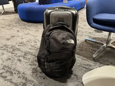 elizabeth-suitcase-airport-lga-carry-on