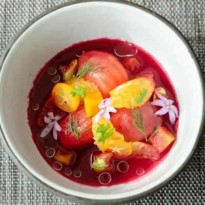 A new plant-based multi-course dinner coming to Eden, featuring a close up of the Golden Beet Tomato Ceviche