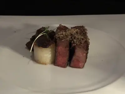 Icon of the Seas Empire Supper Club steak