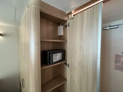 Safe and hidden closet in Spacious Infinite Central Park Balcony Cabin on Icon of the Seas