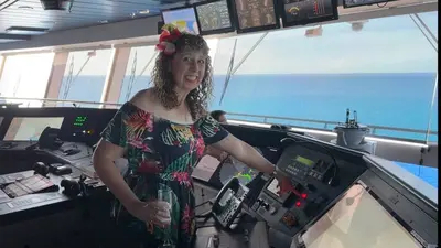 Marcy blowing horn on cruise ship