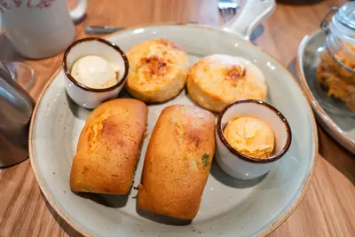 biscuits and cornbread on a plate