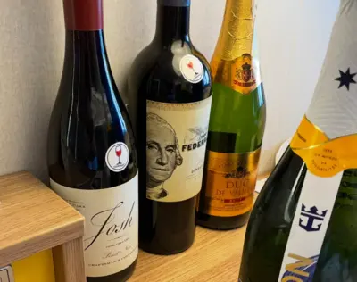 Bottles of wine with corkage sticker