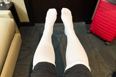 wearing white compression socks