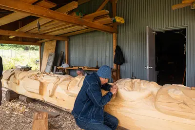 carving a totem pole in Icy Strait Point