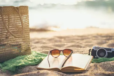 Reading a book on the beach