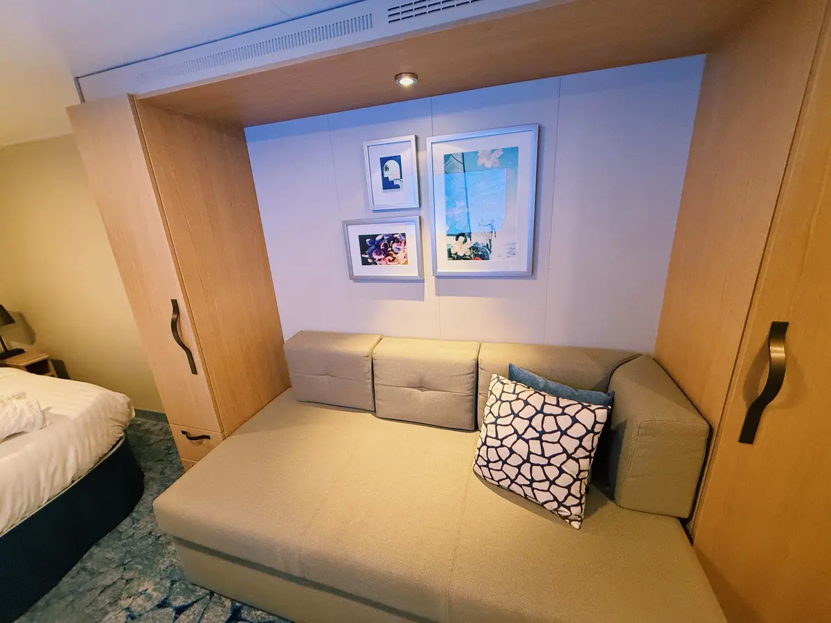 Couch in cabin on Utopia of the Seas
