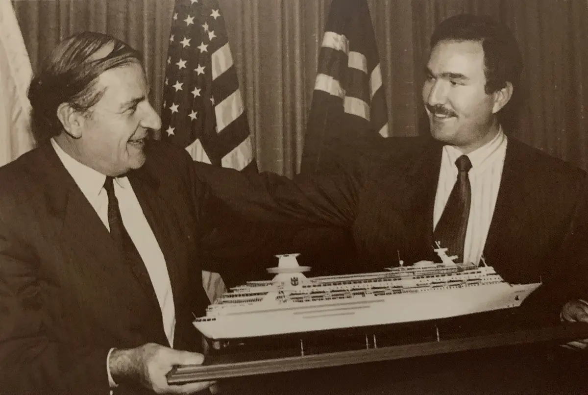 Richard Fain with model of Sovereign Class ship