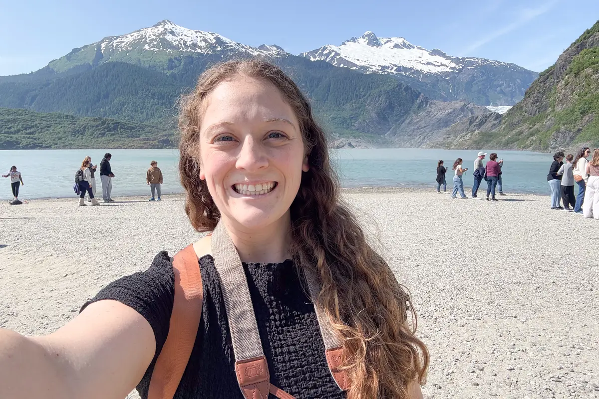 Jenna taking a selfie at Nugget Falls in Juneau