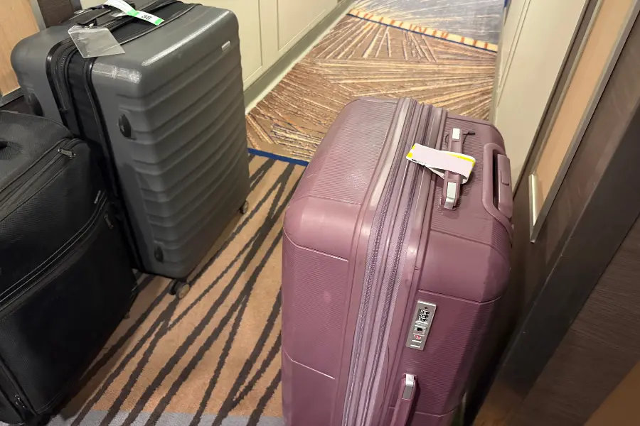 luggage in hallway of cruise ship