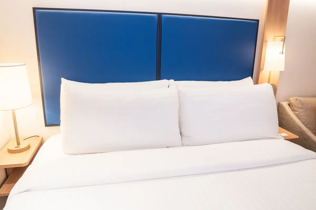 bed in Star of the Seas interior cabin