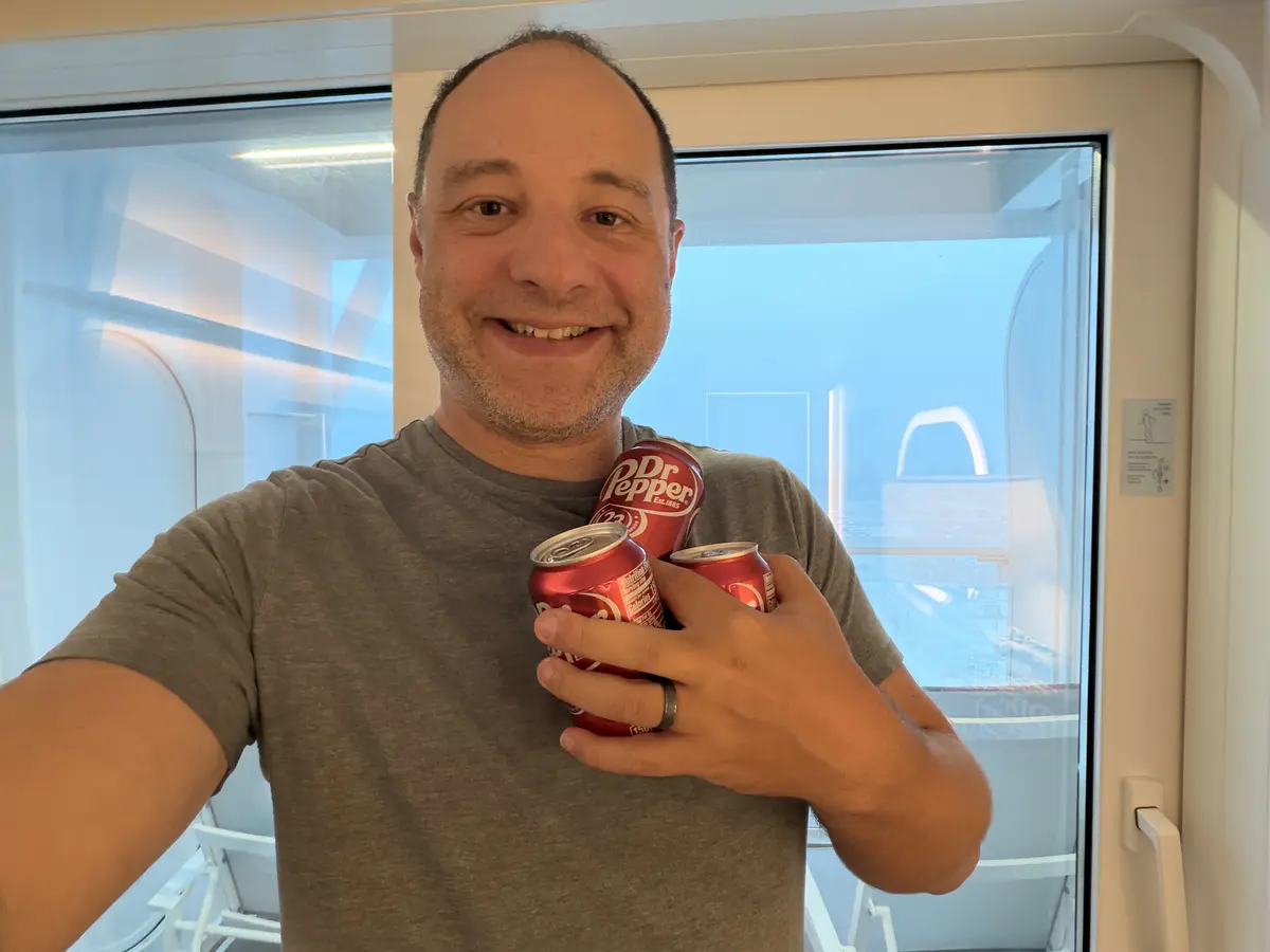 Matt with cans of soda