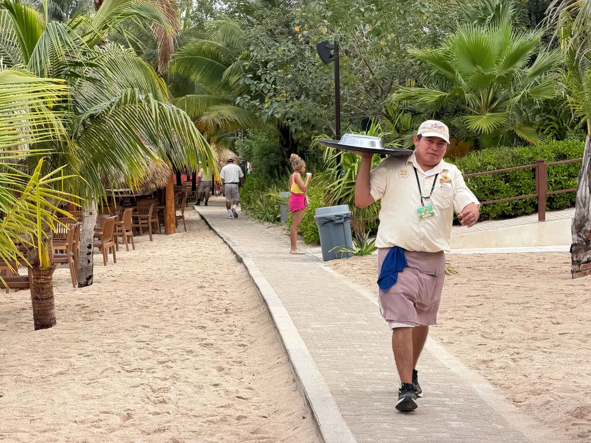 Waiter delivering food