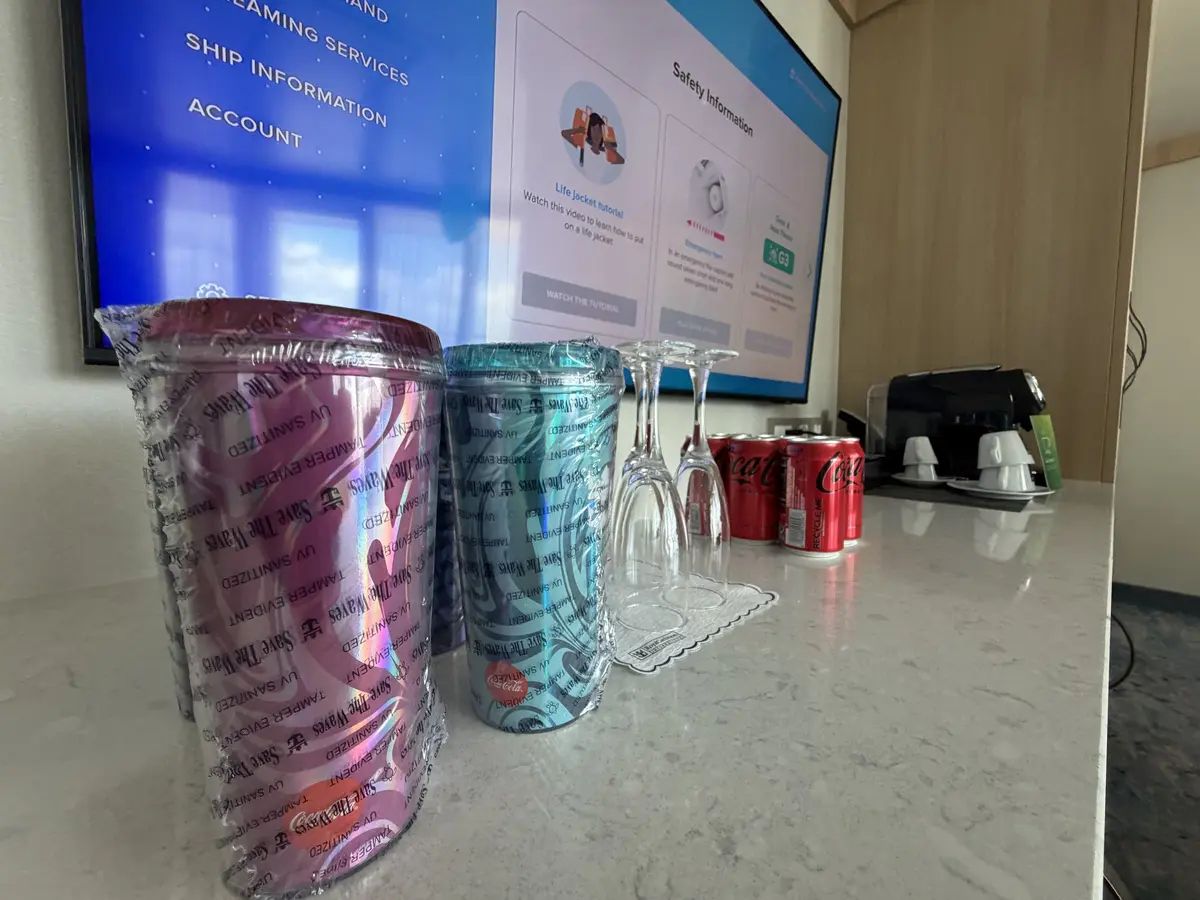 Coke cups, tv, coffee machine