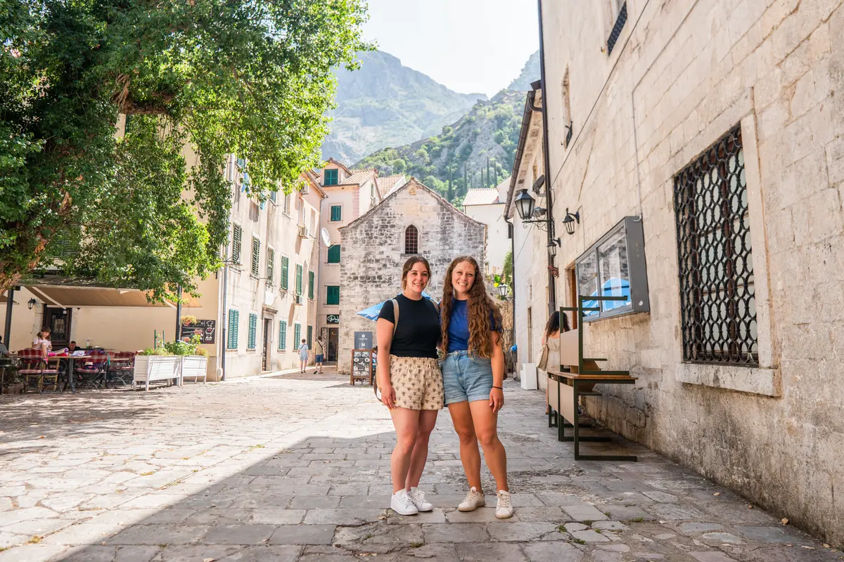 Two girls standing in Kotor, Montenegro