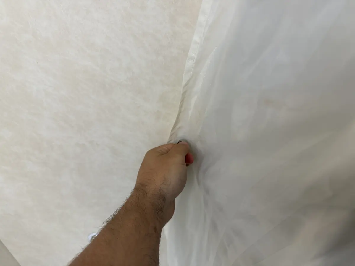 Magnets holding shower curtain