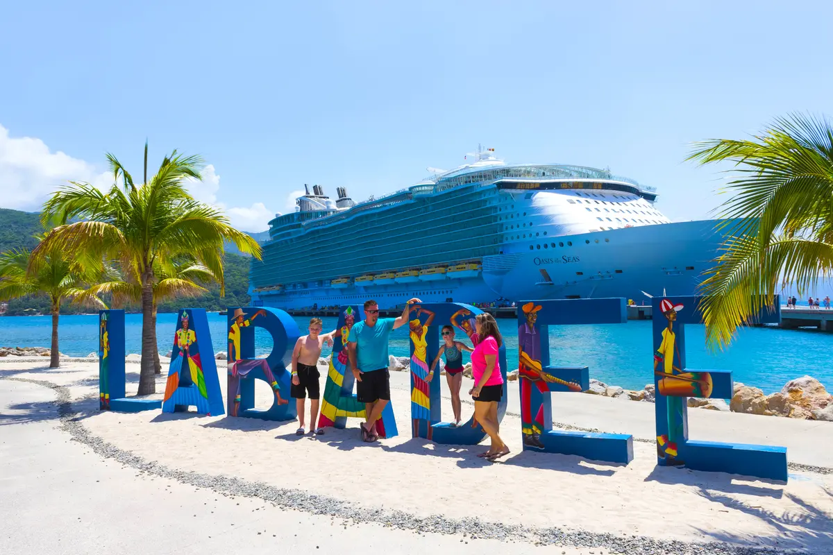 Labadee sign with family posing