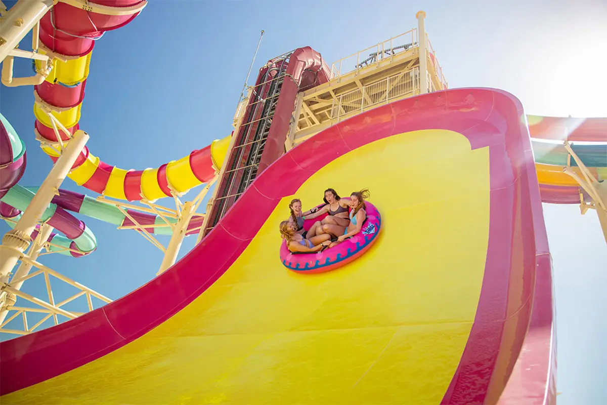 Family on a raft slide