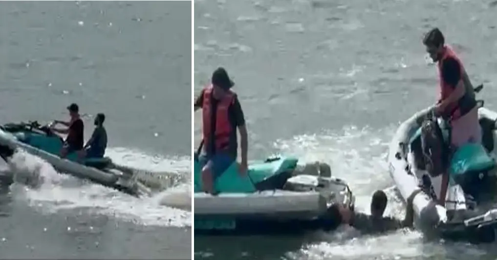 Man on jet ski, left. Rescuing man that jumped, right.