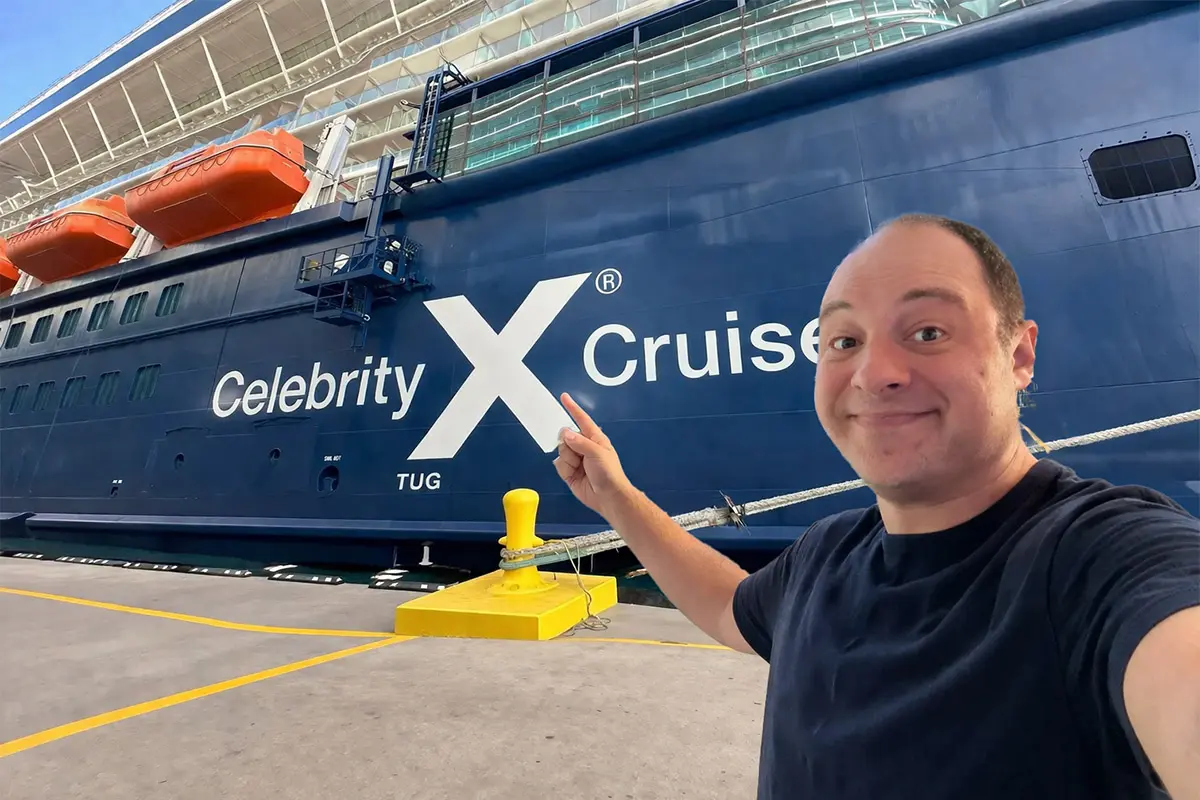 Matt in front of a Celebrity ship