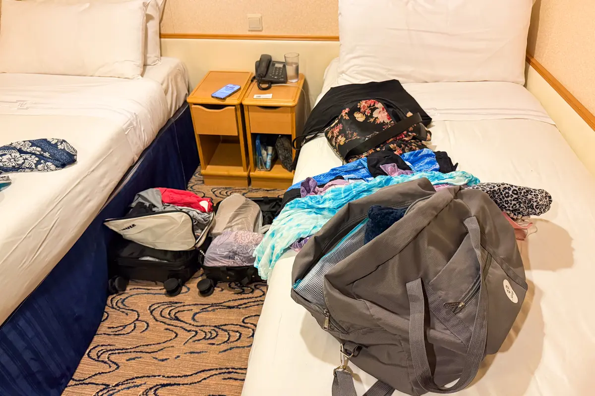 unpacking in cruise ship cabin