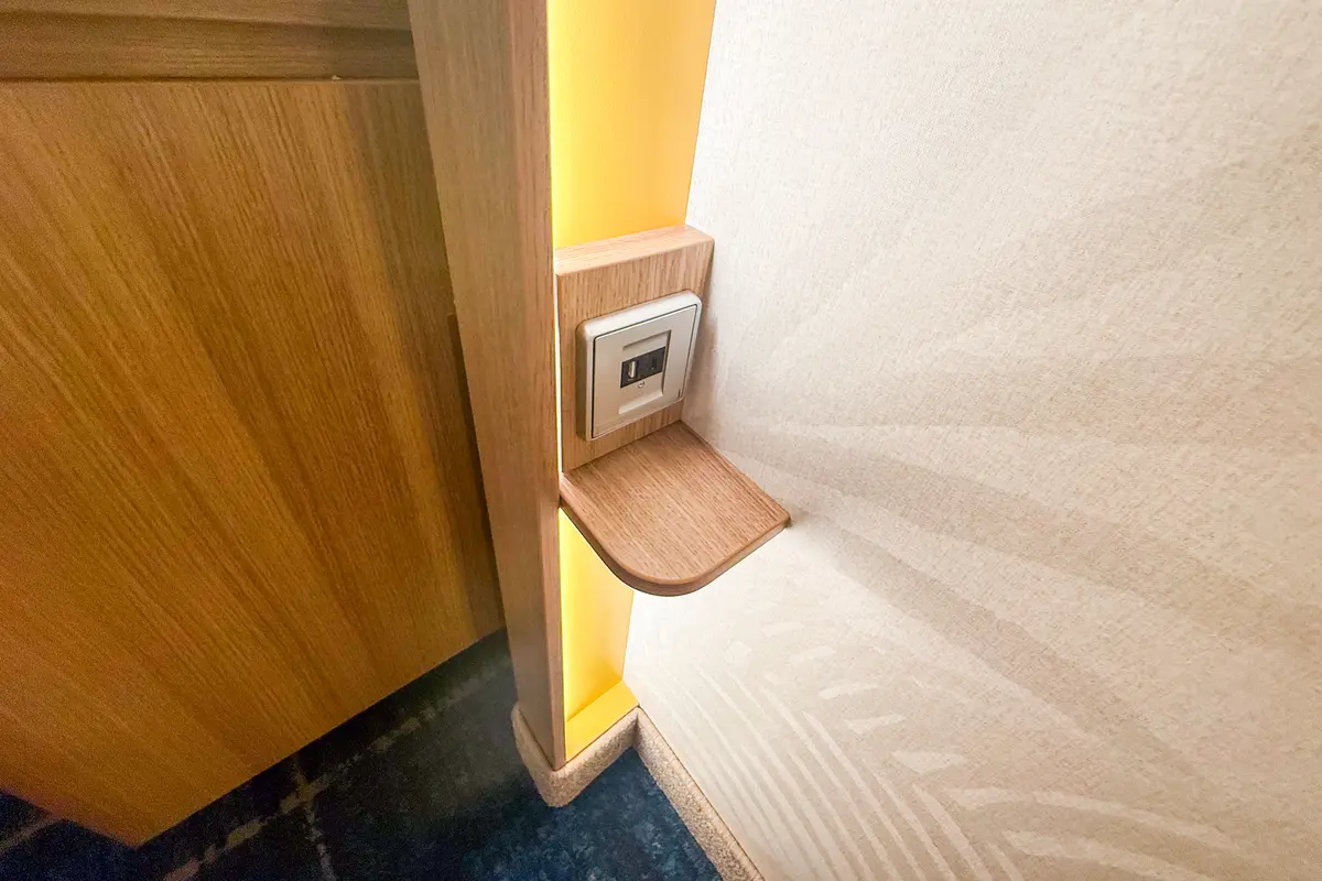 USB charging port in Star of the Seas interior cabin